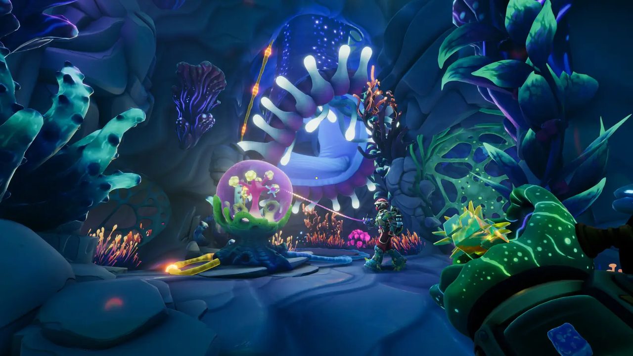 Bioluminescent grotto with creatures inside a glowing sphere
